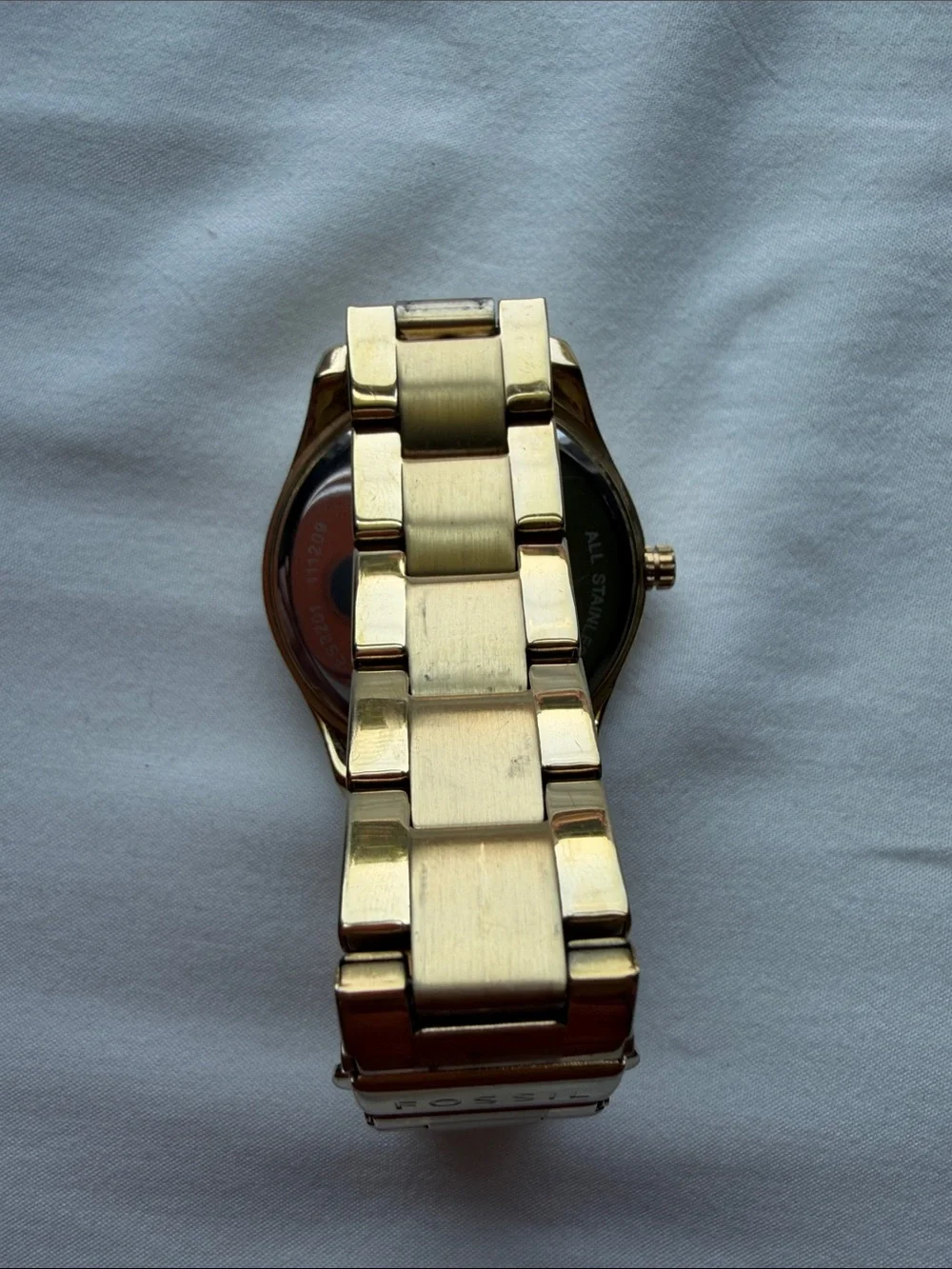 Fossil Women’s Gold-Tone Multi-Function Crystal Bezel Watch
